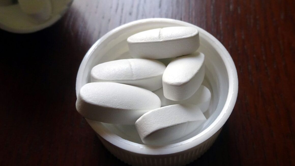 ip 115 oval white pill