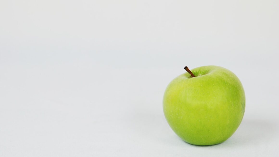 a green apple appears green because it reflects light that is