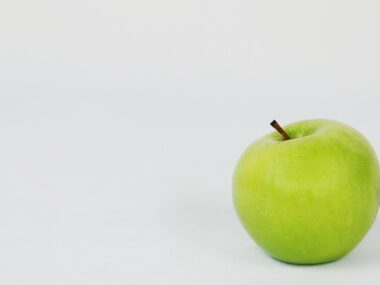 a green apple appears green because it reflects light that is
