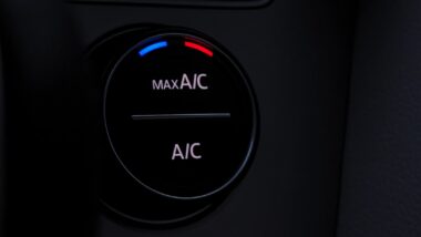 why is my ac compressor turning on and off in my car